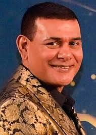 This is illegal. Plain and simple.

Service charge belongs 100% to employees. Service charges are collected in USD.

Therefore, the full service charge must be paid to employees in USD.

Service charge is not resort income/revenue.

100% of it belongs to employees.

The full