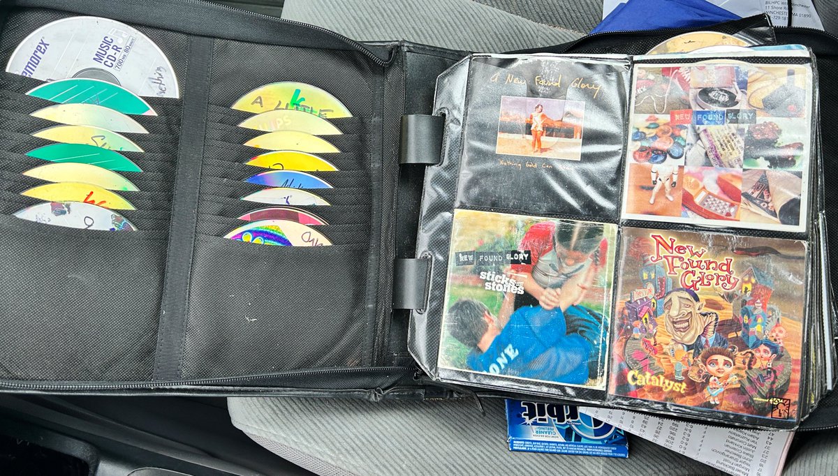 michaelFhurley's tweet image. Everyone laughs at the guy driving around with the massive CD book right up until it’s tune-cranking time and there’s a Verizon outage.