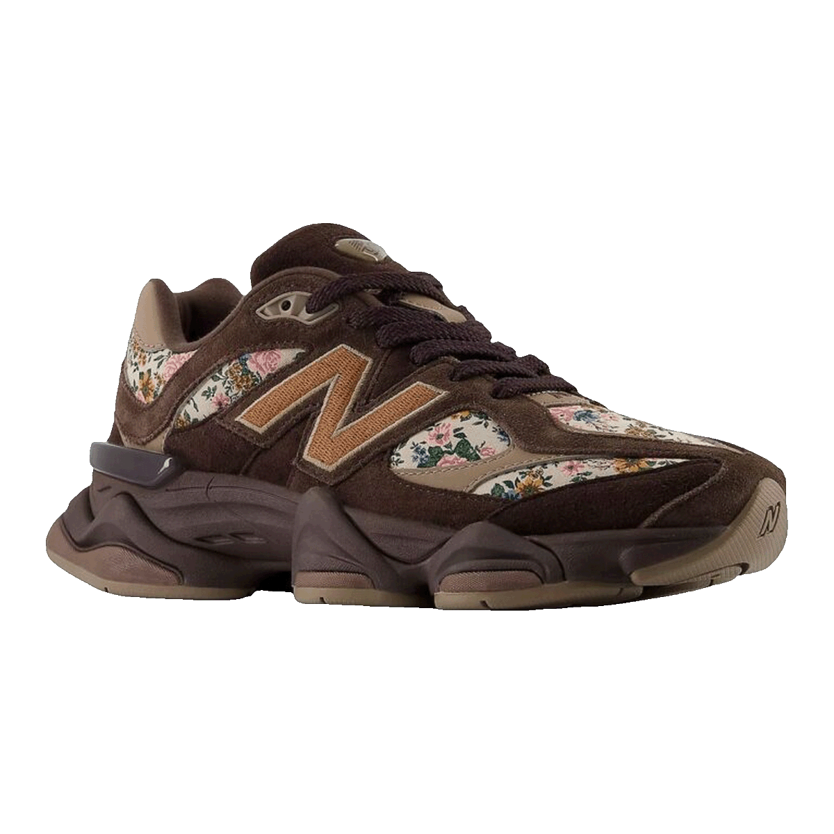 Products's tweet photo. Discover timeless beauty in the New Balance 9060 Atmos Pink sneaker with elegant floral design.