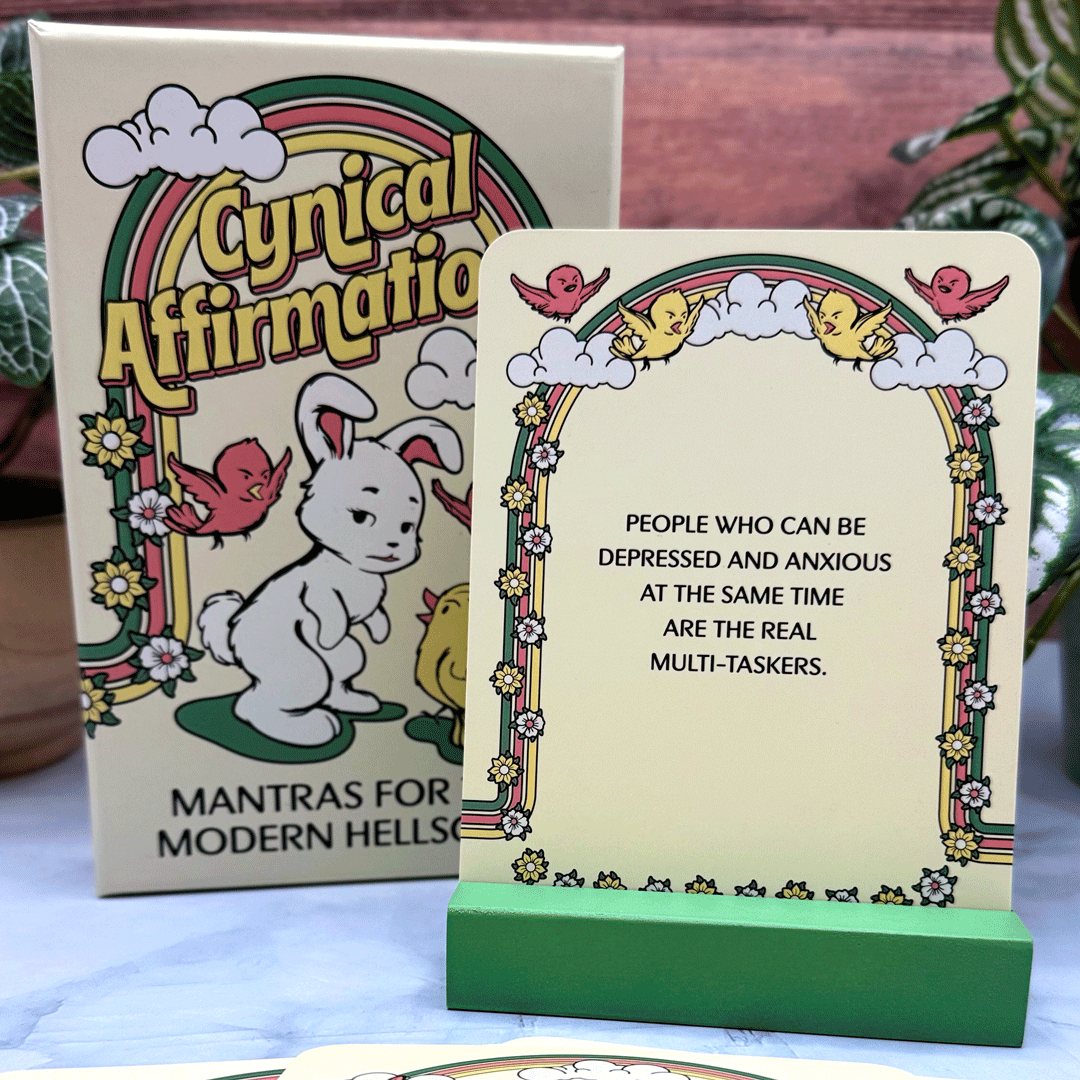Products's tweet photo. Laugh at the dystopia with Cynical Affirmations – 52 darkly funny mantras for modern hell.
