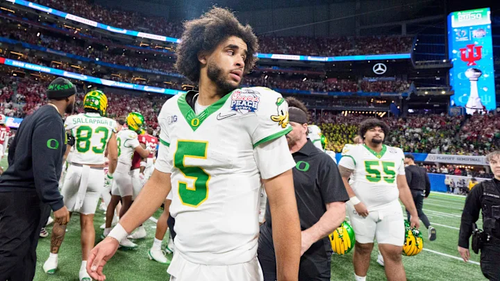 RalphVacchiano's tweet image. Dante Moore, the Oregon QB who might have been the second QB taken in the 2026 NFL Draft, announced he will NOT enter the draft and will return to school.