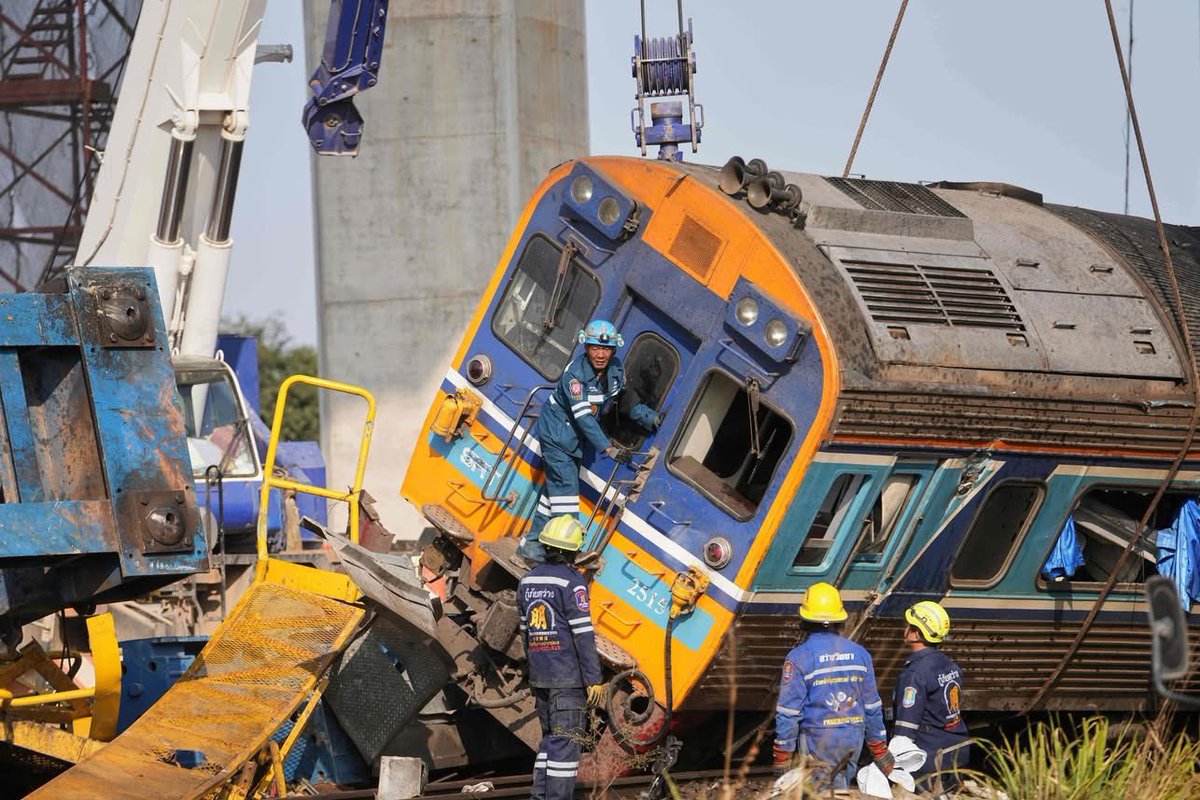 MiddGroundPost's tweet image. A construction crane crashed into a moving passenger train in northeastern Thailand on Wednesday, causing a derailment that resulted in the deaths of at least 32 people and injuries to dozens more.