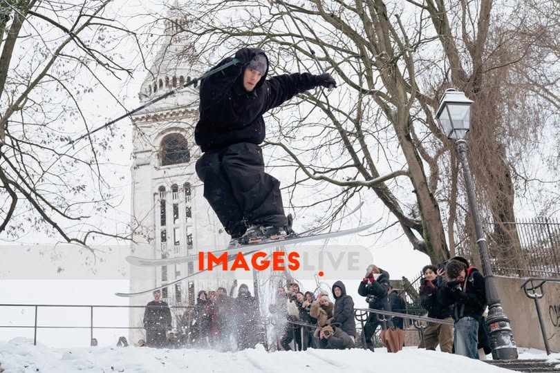 imageslive's tweet photo. Paris, France: A Parisian skis and jumps through the Montmartre district amid heavy snowfall, as snow and ice disrupt daily life across northern and western France. https://t.co/4mtsPiAUz6