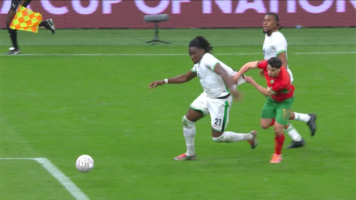 Algeria_FC's tweet image. After watching the replay, it’s actually a good decision by the ref to give the free kick to Morocco and show Calvin Bassey the yellow card

The rules say you have to let Brahim Diaz and Morocco through on goal