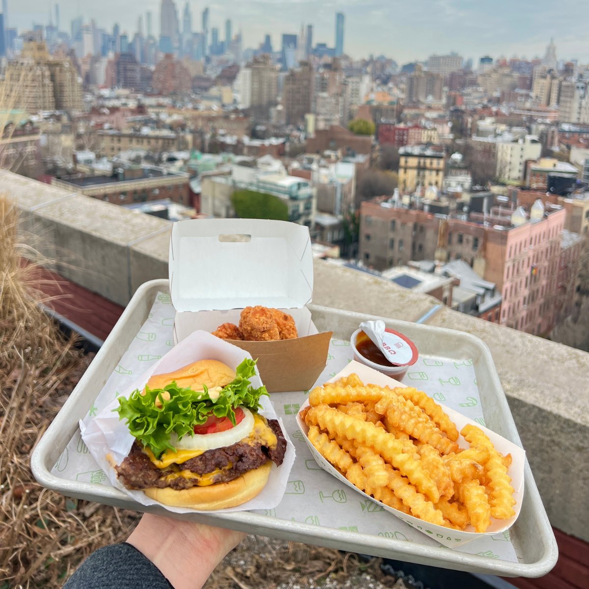 shakeshack's tweet image. We've got your order ready for tour 😉💜 #BTS_WORLDTOUR