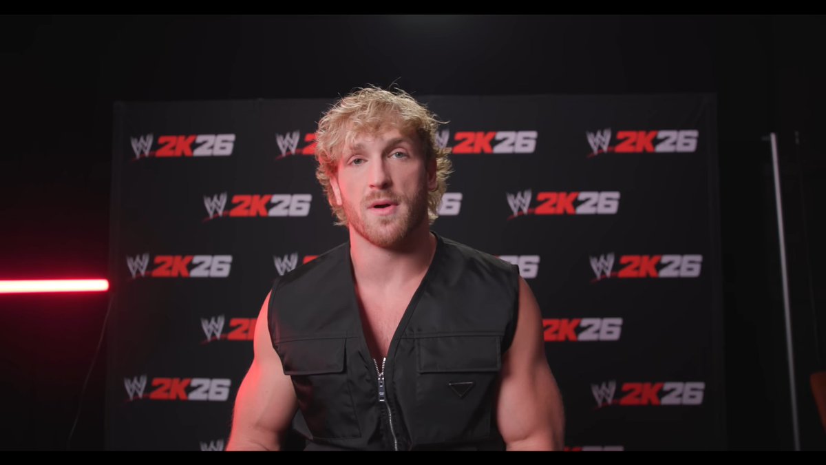 Smacktalks's tweet image. Logan Paul's latest vlog features a segment with the WWE 2K26 logo in the background, however rather than use the regular design, the version shown uses the old WWE scratch logo.

Could this be a teaser for an Attitude Era or Ruthless Aggression themed game? Thoughts?

#WWE2K26