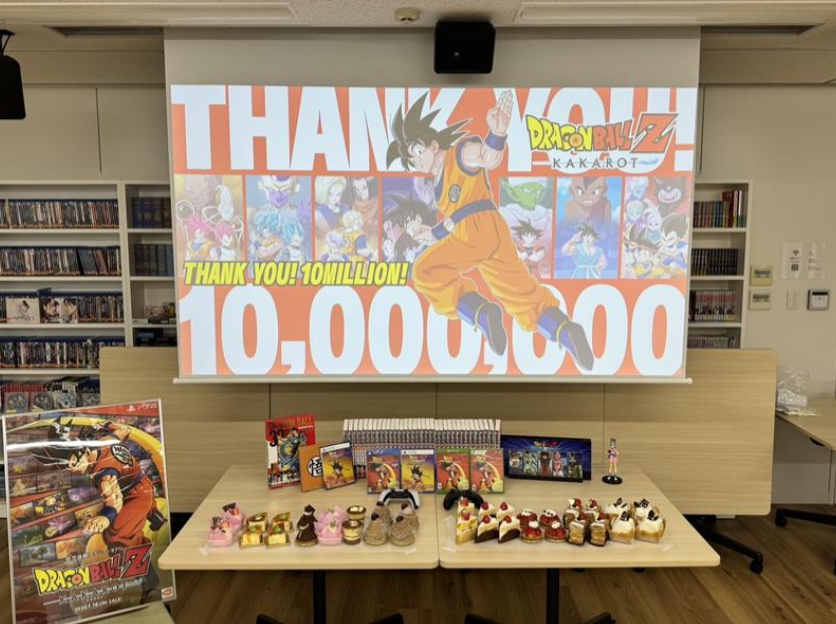 PIROSHI_CC2's tweet photo. DLC8弾『-DAIMA- 魔界の大冒険！ PART2』発売記念
＆『#ドラゴンボールZKAKAROT』1,000万本突破！

サイバーコネクトツー福岡本社＆東京＆大阪スタジオの全スタッフにお祝いのケーキを配布しました。

みんなお疲れ様＆おめでとう！ https://t.co/wh4oboWwhh