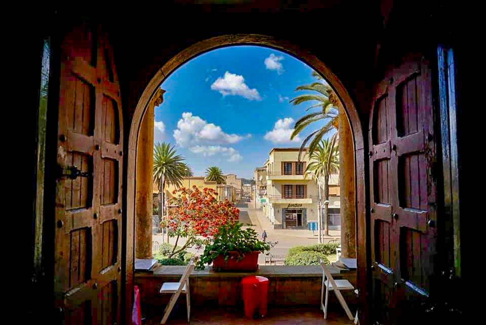GhideonMusa's tweet photo. This view: proof that beauty waits patiently beyond every threshold in Asmara.
Lovely shot from Cinema Asmara  #Eritrea 
📷 Ruud van Alebeek https://t.co/xSW4DTurOj