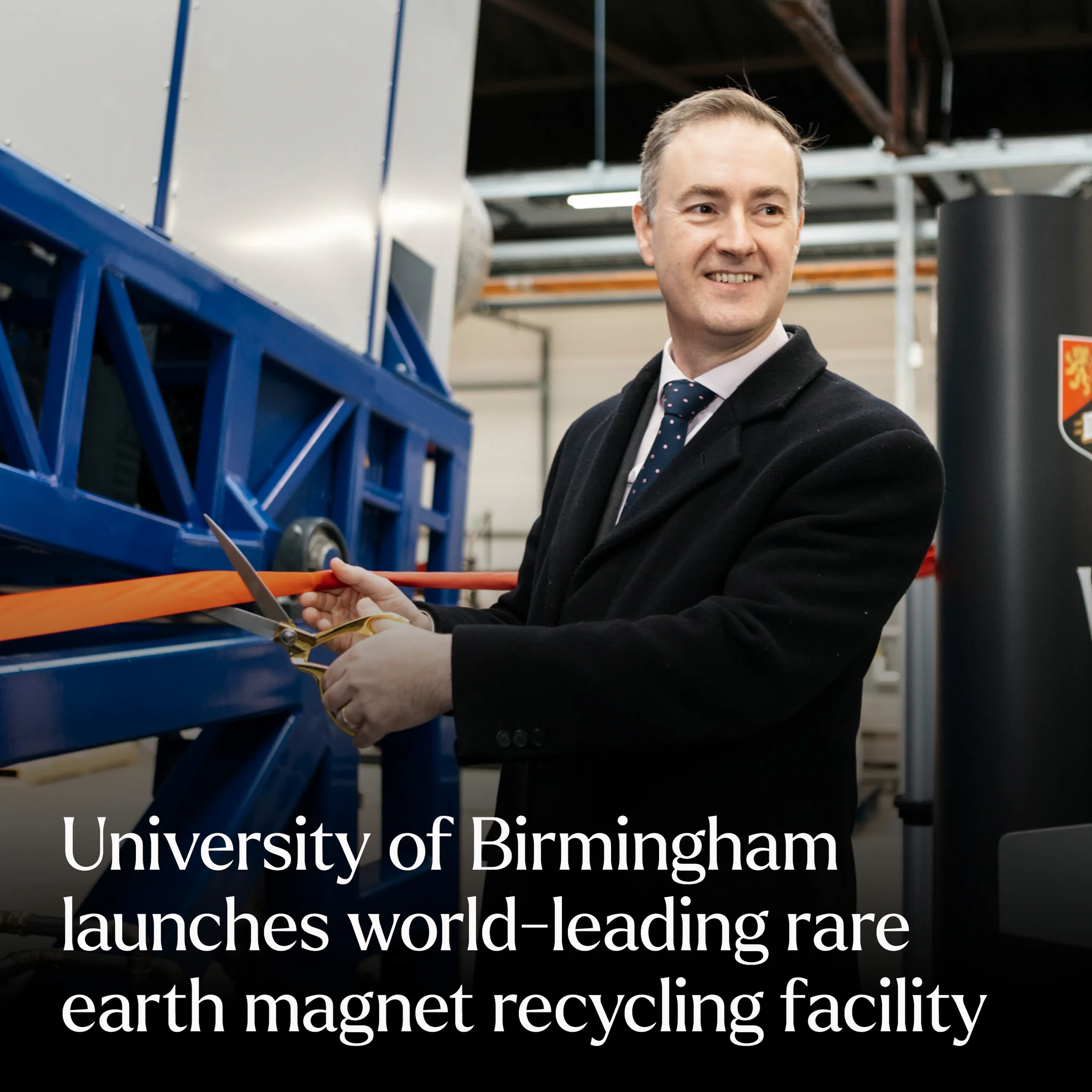 Chris McDonald MP cutting a ribbon at the magnet recycling facility opening at Tyseley Energy Park in the West Midlands