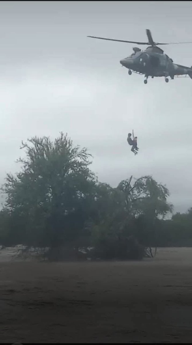 SAPoliceService's tweet image. #sapsLIM [AT THIS HOUR] #SAPS pilots and #SearchandRescue teams, working alongside the #SANDF and other emergency services, have been deployed to assist with the rescue of residents stranded by severe flooding in parts of Limpopo.

President Cyril Ramaphosa has visited the flood…