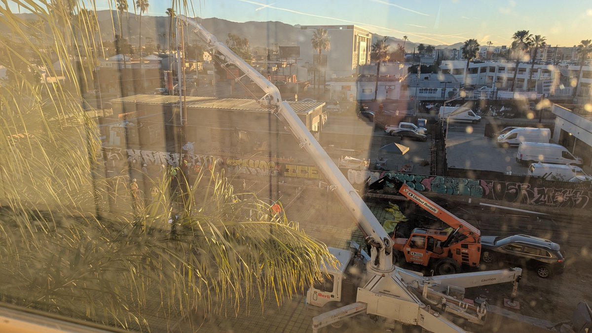 Probably one of the most questionably dumb machines I've seen used. It pumps concrete up 5 stories, just for it to come out lower than where it started. 

Now I'm no expert, but....