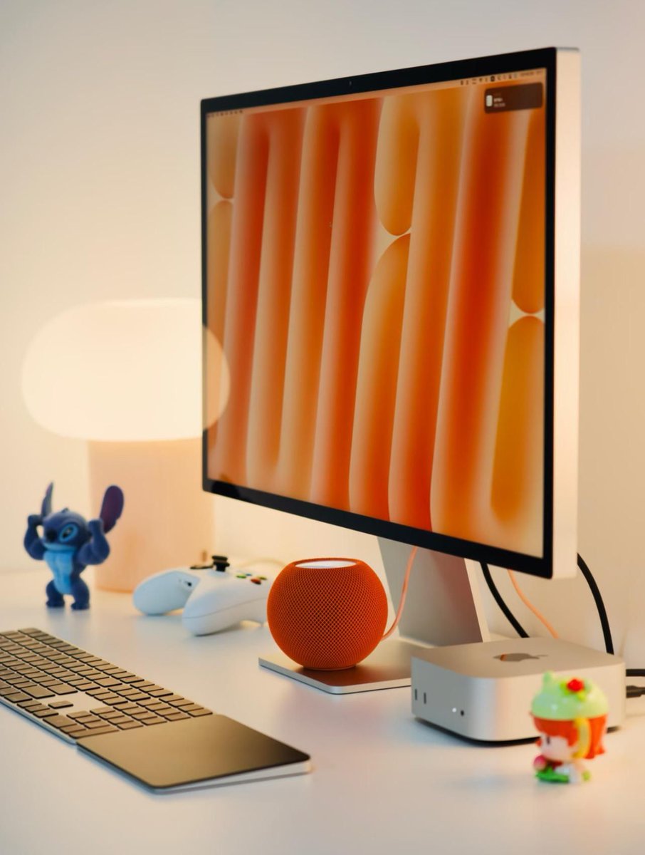 Clean Mac desk setup with warm tones and a clutter-free layout. 🍊

📸 u/OptionAggressive554