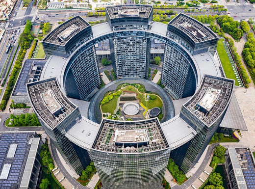 #Hangzhou’s circular skyscraper cluster looks like a giant hug wrapping around economic growth and innovation. #ChinaEconomy #InnovationHub