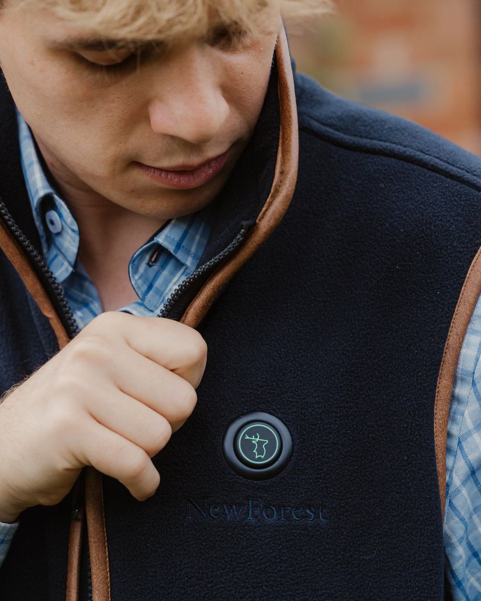newforestcloth's tweet photo. Stay toasty in style 🔥 The New Forest Heated Fleece Gilet is here — three heat zones, three settings, and a glowing stag‑head button. Available in Olive or Navy, and ladies fit too. Perfect for walks or city life.

Grab yours now 👉 https://t.co/0zwKrIhF5B

📸 @countrycontentuk https://t.co/XSV4jdRsQi
