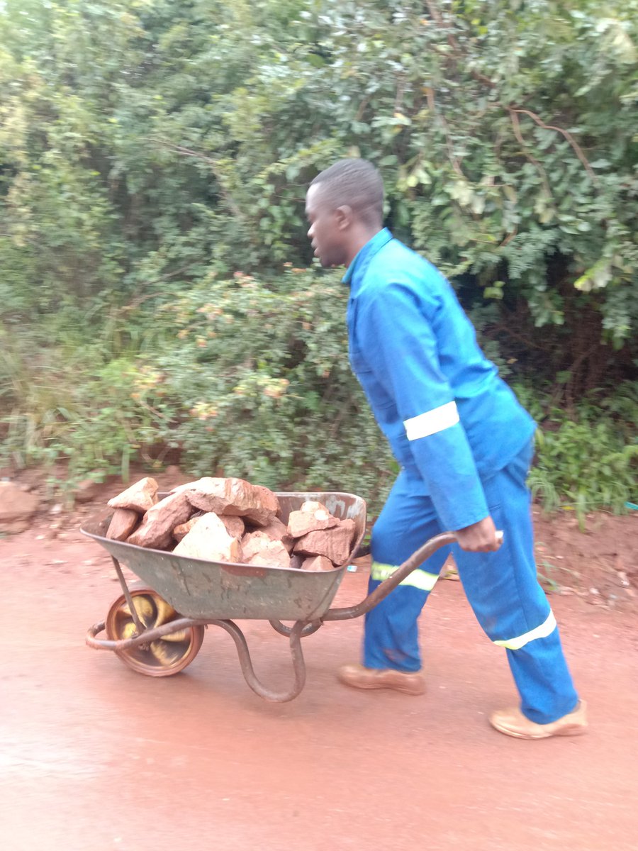 Today myself and my little brother we have  collected the stones inorder to pave the national gravel road which is passing by our village,situation is very bad,cars were not passing but we came with the temporary solution 😢💔