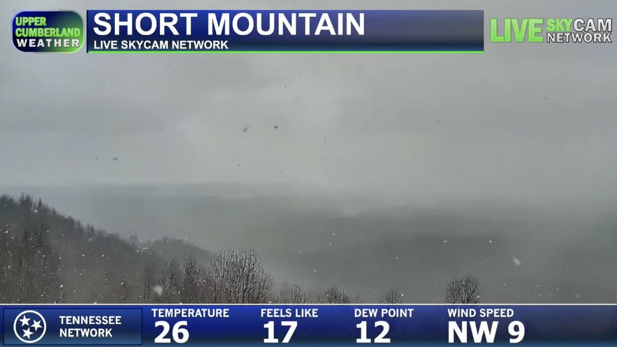 The ONE day I have to be out of pocket, it comes a random late morning/midday snow…go figure. Below are some images taken from our SkyCam Network a few hours ago during height of activity. We still have a few snow showers out there, although coverage is lessening. Some areas