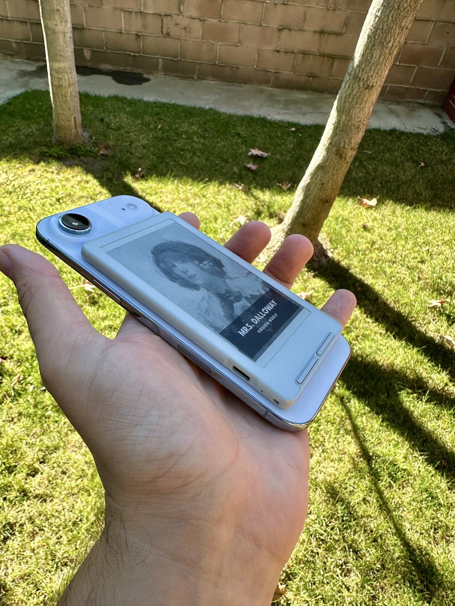 GregFeingold's tweet image. I got that mini e-reader that everyone was talking about!

I love how small and light it is, fits perfectly with my iPhone Air. 

The software is super bare bones and DIY. I’m going to use Claude Code to make a new OS for it. To be continued!