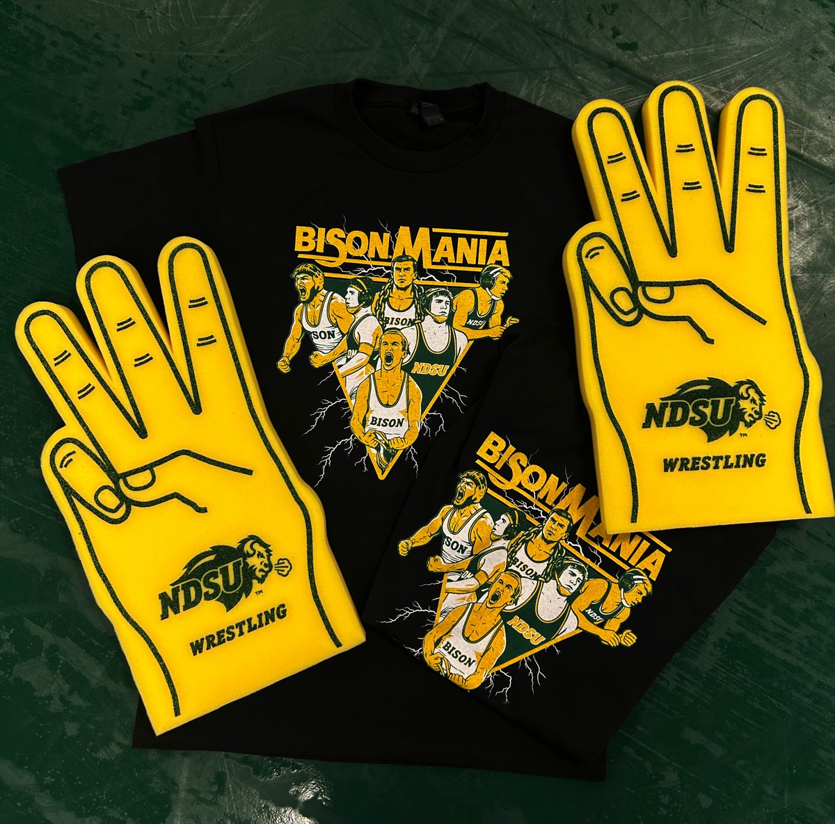 NDSUwrestling's tweet image. Don't miss out on these wrestling giveaways for the upcoming matches! Be one of the first 250 fans in the door on January 25th to get a WWE-inspired Bison Mania T-shirt or come to the match on January 30th and get a takedown 3 foam finger!