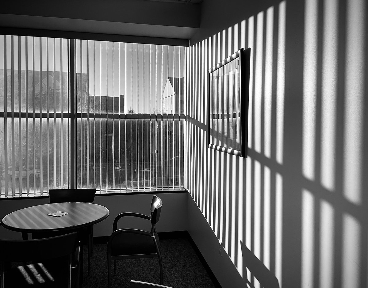 TouroLawLibrary's tweet photo. Shadows stretched across the walls like unanswered questions, thin at first, then widening, darkening, claiming territory inch by inch. I had begun to measure my days by them. The law library was quiet, winter break leaving it colder than the cases on the shelves. https://t.co/dtIvdw7gxK