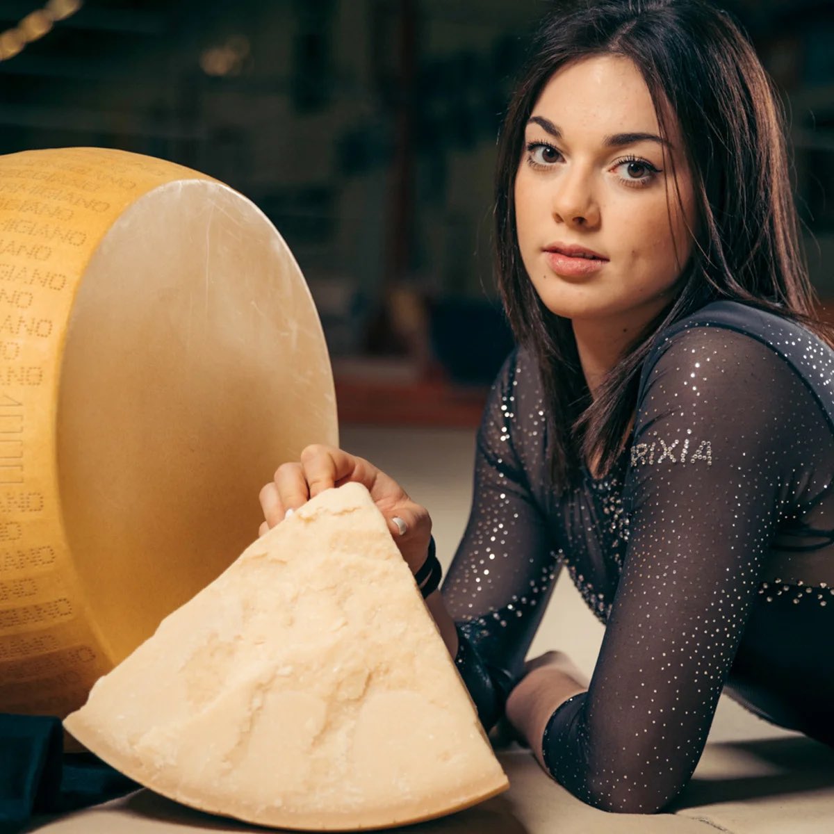 cinecitta2030's tweet image. Fun fact: Olympic gymnast Giorgia Villa is sponsored by Parmigiano Reggiano and poses with wheels of cheese