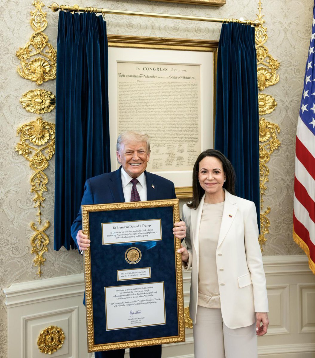 RpsAgainstTrump's tweet image. Trump with the Nobel Peace Prize medal presented to him by María Corina Machado.

The Nobel Committee issued a statement clarifying that “Once a Nobel Prize is announced, it cannot be revoked, shared, or transferred to others.”