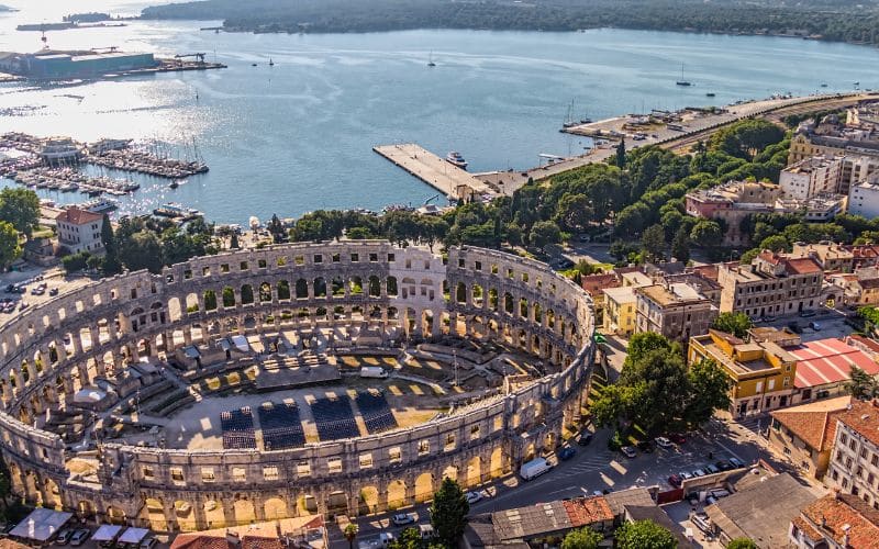 Roman Arena in Pula is still in use after two thousand years, for concerts and festivals. 
In reality it looks like this.