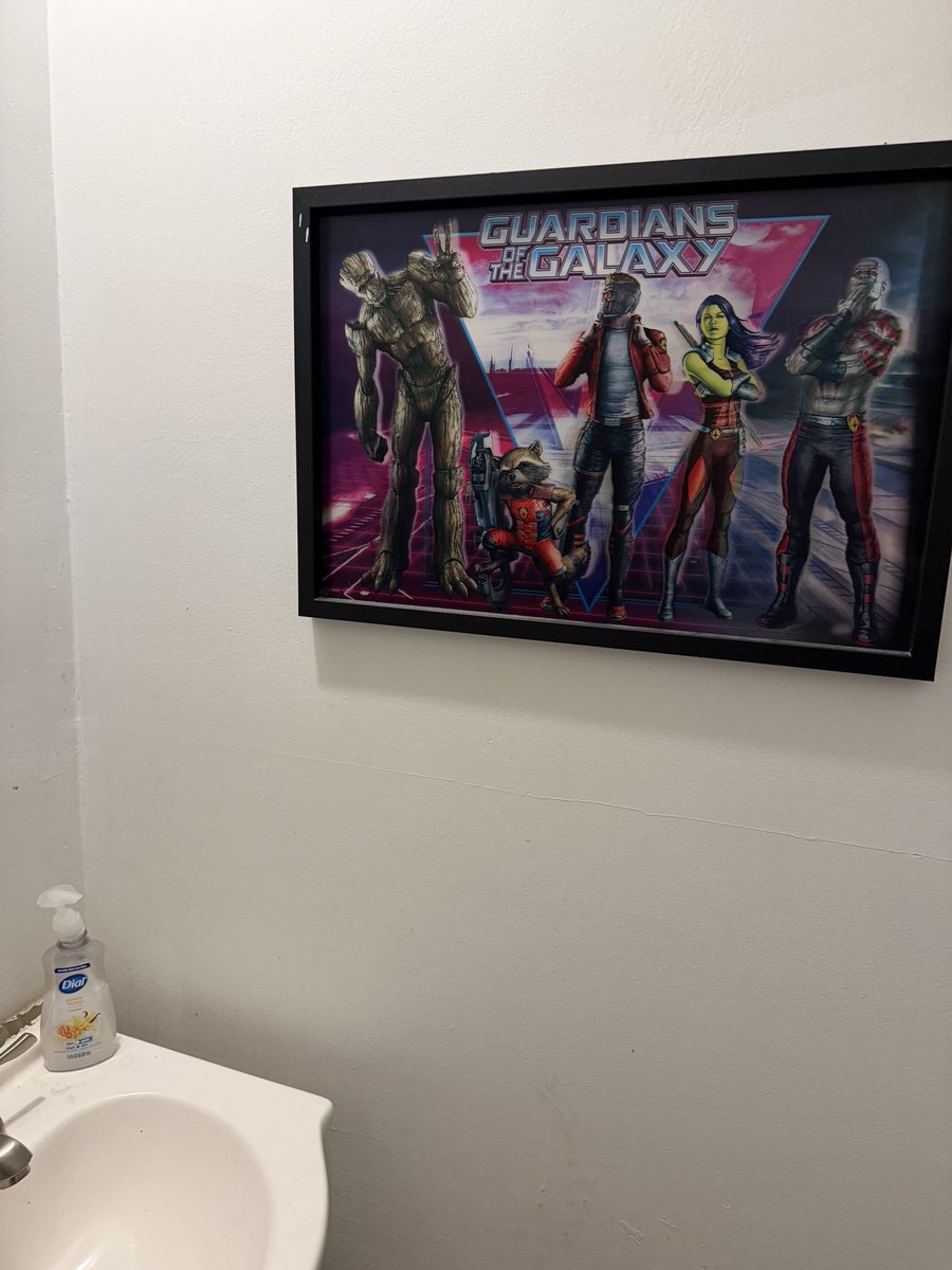 why does my local comic book store have this inside of their bathroom. why are the guardians watching me piss