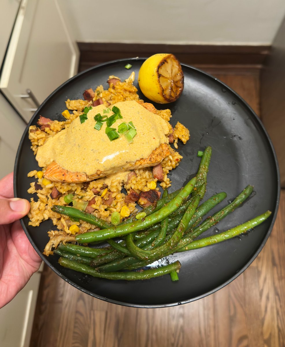 Cajun salmon, jambalaya, Cajun cream sauce and spicy string beans 🍽️