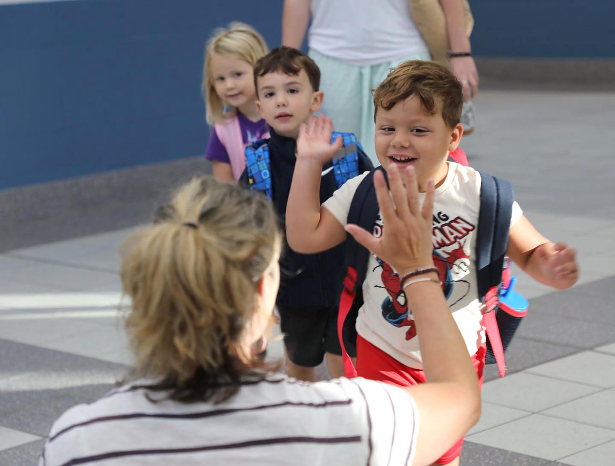 It can't possibly be a bad day when you start with high-fives from Principal Gilsinan! #PrideInTheHive