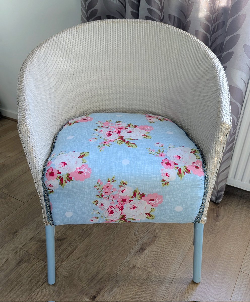 Very proud of my wife's first upcycling project. An old wicker chair which she repaired and sprayed, then re-upholstered and braided.

I think she has done a cracking job. It is SO comfortable!