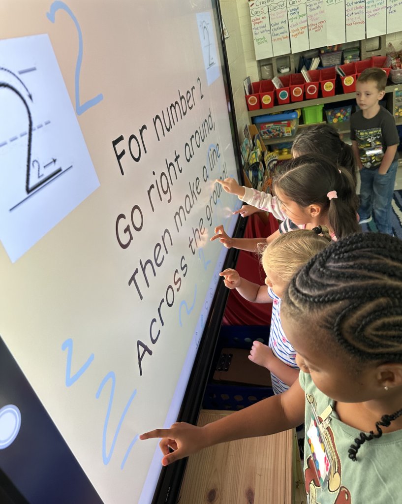 Our Kindergarteners in Mrs. Abraham's class are loving the new technology! They’re practicing number writing skills in fun and engaging ways 💻✏️ #FutureMathematicians #KMDolphins #MakingWavesAtKM #learnleadsucceedbpd3