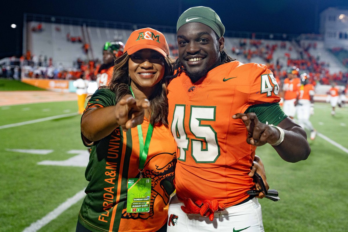 FAMUSJGC82's tweet photo. First home game. First win. Same SJGC energy. 💪🏾💚🧡Our students and alumni pulled up, geared out and showed love as FAMU took on Albany State.
From the press box to the sidelines, our students are representing #SJGCExcellence everywhere you look. 📸🔥
Special shoutout to the Queen of Orange & Green 👑 Tamia Williams (broadcast journalism student) and our very own Nay’Ron Jenkins (#45 on the field & senior broadcast journalism student) for holding it down for SJGC at every game. 🐍✨
#FAMU #SJGC #OneVoiceOneSJGC #RattlerPride