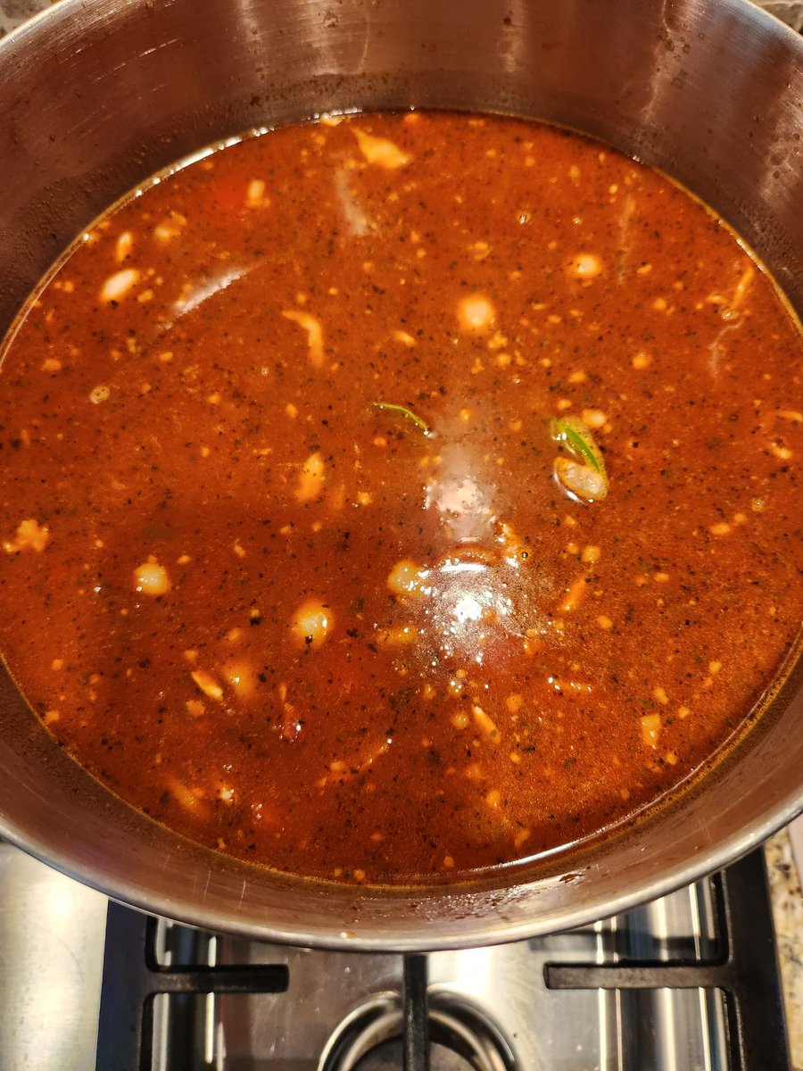 Charro beans going with my homemade beef stock made with some epazote, black garlic, and morita chilies along with the standard mirepoix and a couple other secret ingredients. I'll give you a hint, one is from France and provides a nice bit of brightness to the stock.