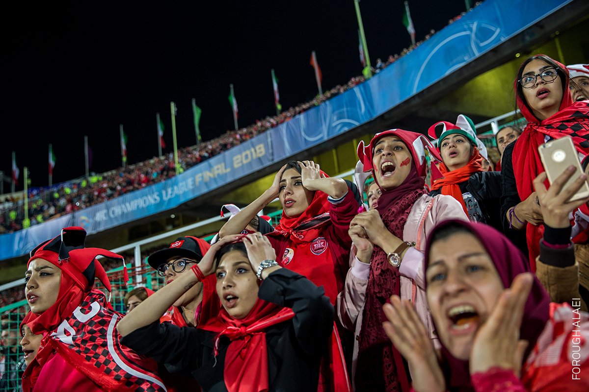 Photo of the Day | Women watch the AFC Champions League Cup match between Iran’s Persepolis and Japan’s Kashima Antlers from a segregated section of a stand at the Azadi Stadium, Tehran. Discover the project by <a href="/foroughalaei/">Forough</a>, awarded in the 2019 Contest: worldpressphoto.org/collection/pho…