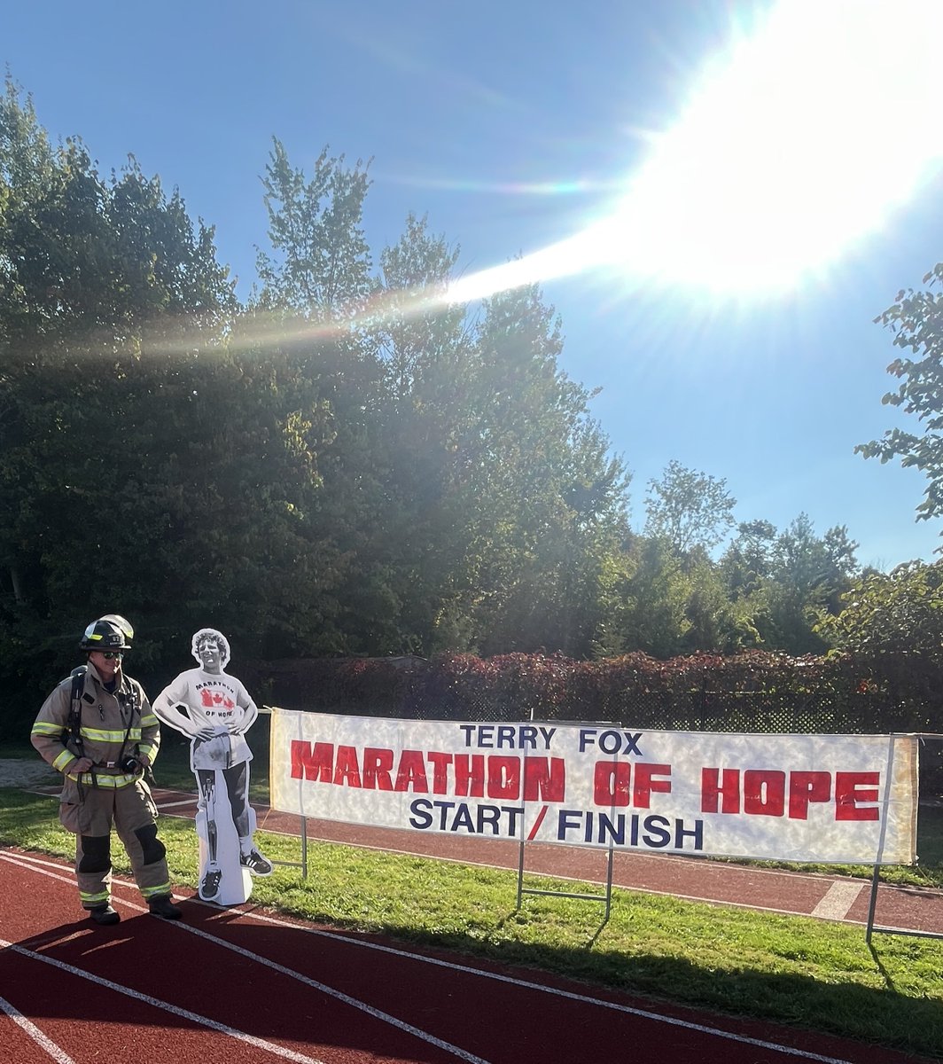 Firefighter de Roos posing with Terry at the Acton Terry Fox Run this morning.  We are proud to be part of the Terry Fox Run on this 45th anniversary of the Marathon of Hope. #FinishIt