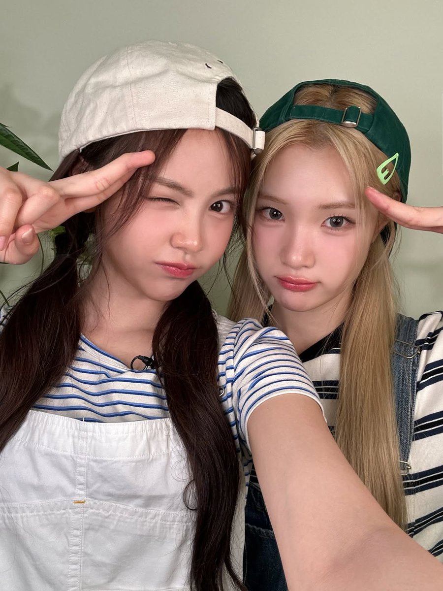 minjullliit's tweet photo. Twinning in stripes and caps turned backwards ✧(•̀ᴗ•́)و We crossed our arms like a serious team but couldn’t resist breaking into peace signs and cheeky winks. Side by side, matching but still our own vibe—it felt like the perfect partner-in-crime moment caught on camera ♡ https://t.co/XgpEW03U5j