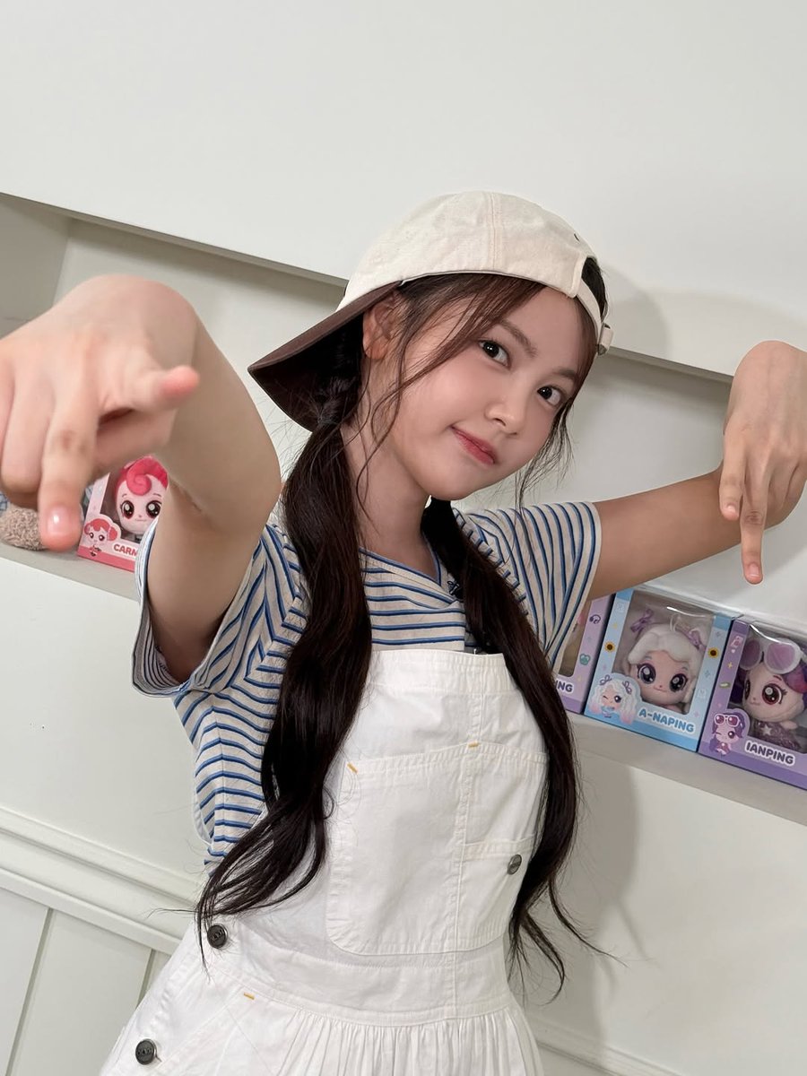 minjullliit's tweet photo. Cap flipped back, striped tee, and my best “serious face” salute ✧˖° but I couldn’t hold it long before turning into goofy poses. Crossed arms, pointing hands, trying to look cool while plushies watched from behind. https://t.co/D2MObQpBpN