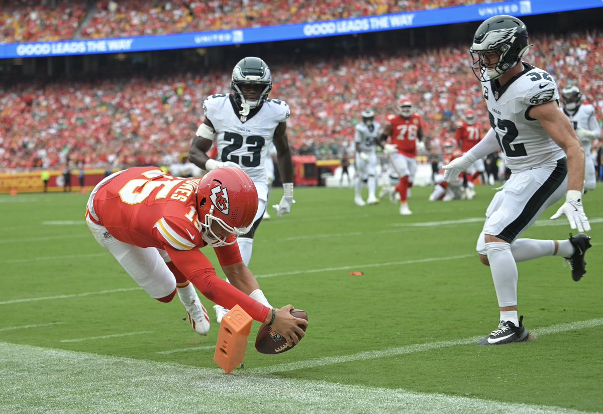 Chiefs quarterback Mahomes gets in for a TD in second quarter against Eagles.