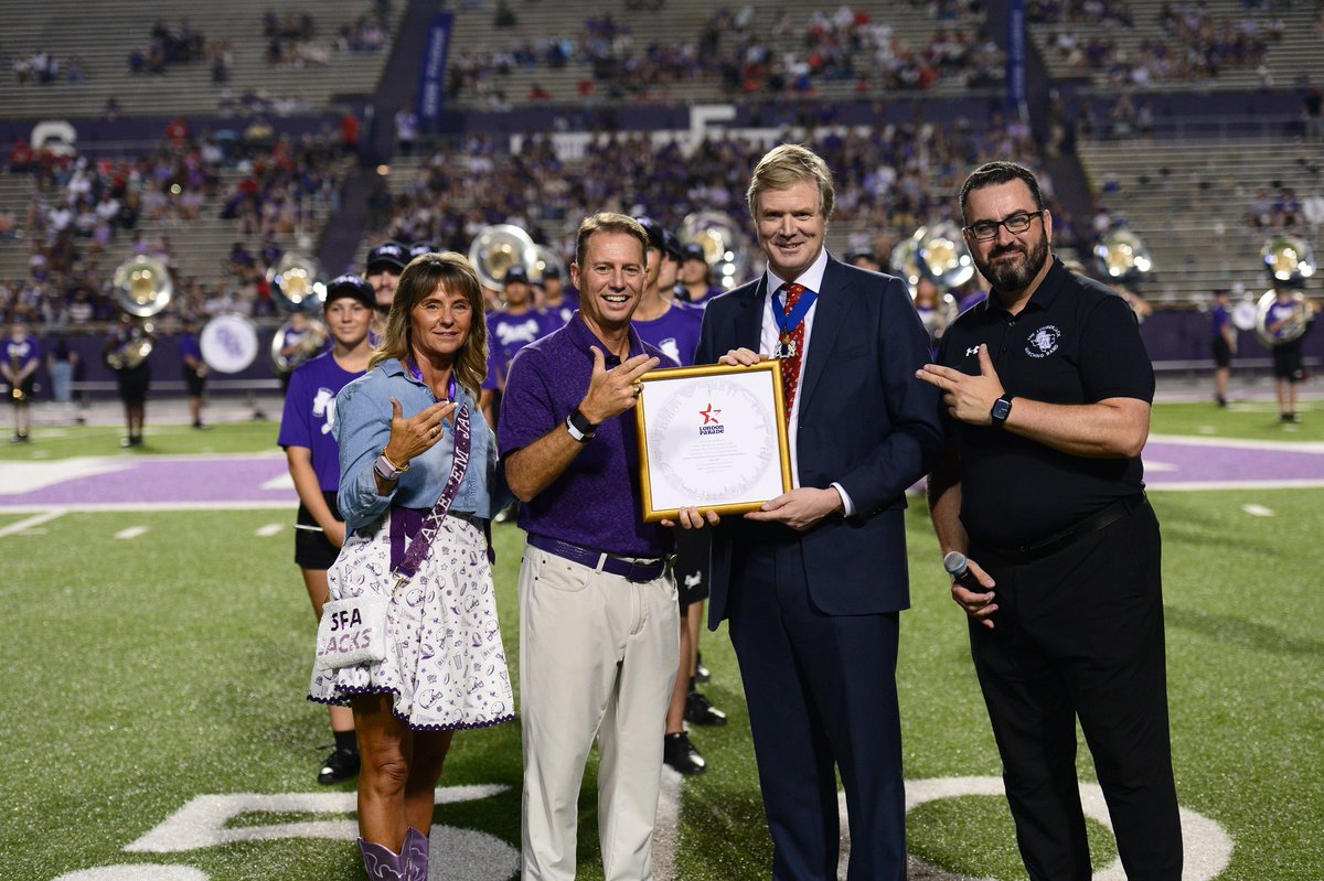 SFASU's tweet image. At last night’s game, the great grandson of Winston Churchill was in attendance to officially invite SFA and the Lumberjack Marching Band to perform in the London’s New Years Day parade to celebrate the LMB’s Centennial year in 2026-2027. 

The Boldest Sound from the Oldest Town…