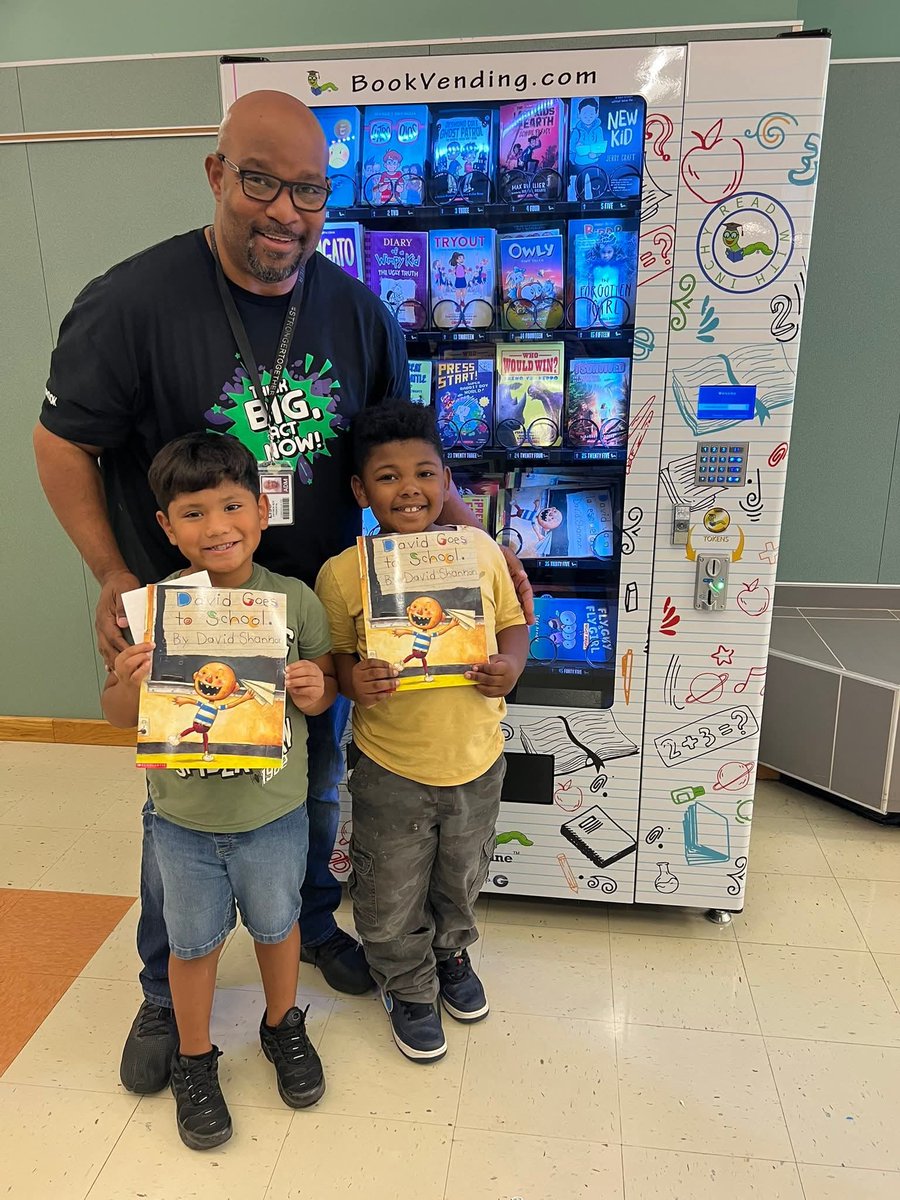 Two lucky students were the first to be able to earn a book from our new book vending machine! This was such an exciting moment for all of us and our students were so proud! We are so thankful to have a book vending machine on our campus!