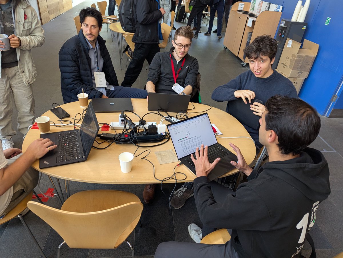 We are sharing a couple of photos from Luca's recent visit to the MLIR (Un)School in Cambridge mlir-school.github.io by <a href="/Tobias_Grosser/">Tobias Grosser</a>. Below <a href="/lucacolagrande3/">Luca Colagrande</a> enjoying inspiring interactions &amp; hacking together with Sasha Lopoukhine on Snitch's MLIR-based compiler backend.