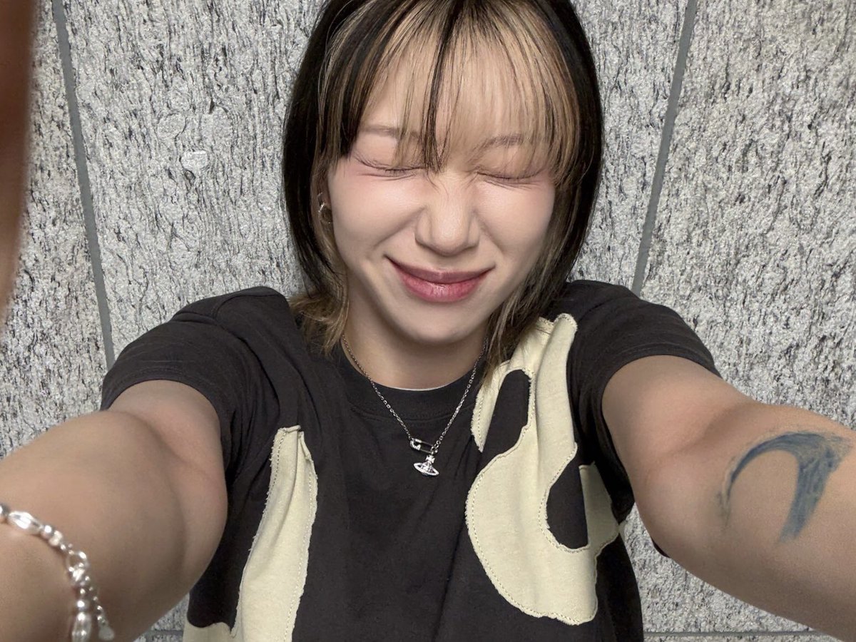 she’s literally —> (( >_< ))
