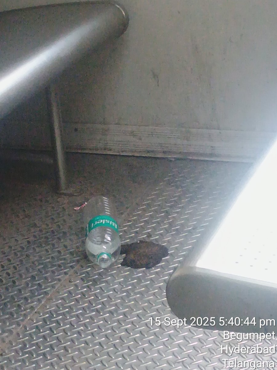TsunilKumar26's tweet photo. Unhygienic condition inside in a Tellapur to Faluknama MMTS train. A  discarded plastic water bottle and dirty patch on the floor near the seating area. This creates an unpleasant and unsafe environment. @SCRailwayIndia
@AshwiniVaishnaw @RailMinIndia https://t.co/9miAmZUFz2