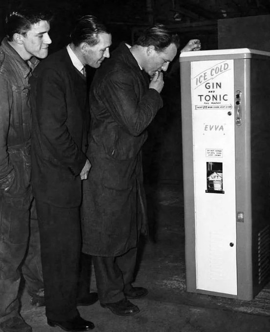 Men trying the Gin and Tonic vending machine, 1960.
