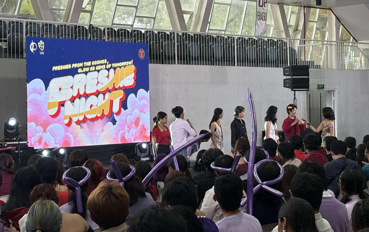 upboutcrop's tweet photo. NOW HAPPENING: Students from various colleges of UP Baguio have gathered at Himnasyo Amianan for Freshie Night 2025.

With the theme “Freshies from the Cosmos, Glow as Gems of Tomorrow,” the six-hour event is the culminating celebration of the month-long welcome for the freshmen. https://t.co/nQzmxLbbtm