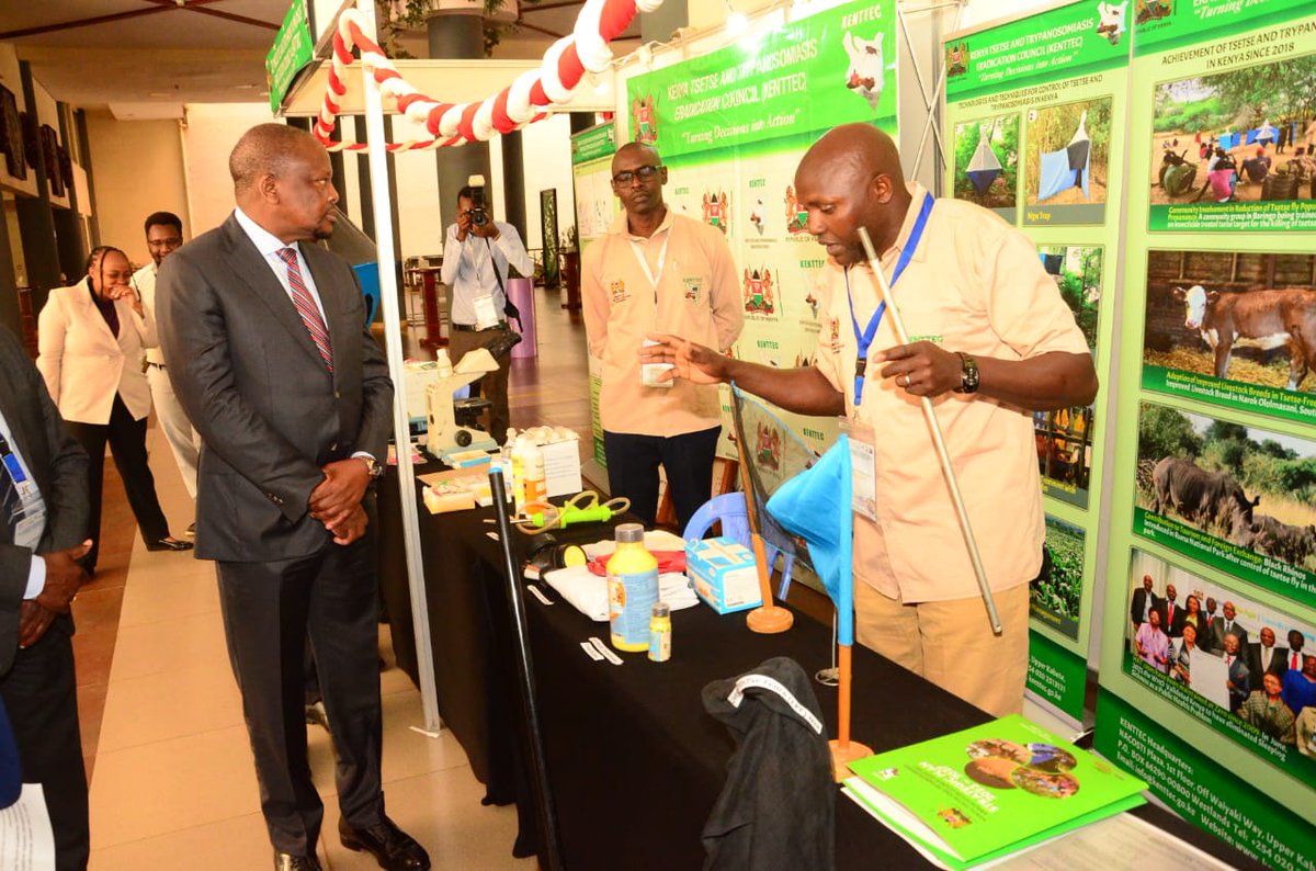 JudithAkolo's tweet photo. Cabinet Secretary for Agriculture Livestock Development Sen. Mutahi Kagwe at the KENNTEC stand at the 37th #ISCTRC2025 ongoing in Nairobi @au_ibar @patricialumba #OneHealth #TrypanosomiasisControl @AU_DARBE https://t.co/ipGYnjDURy