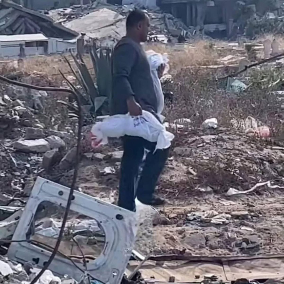 All around the world, fathers cradle their newborn children with joy, hope, and dreams for the future. But in Gaza, fathers cradle their infants in white shrouds like this father, searching for a place to bury his children. 

How long will the world stand by and watch the Israeli