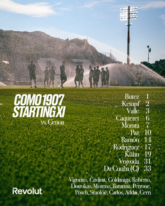A group of soccer players in uniforms walking on a grassy field. Water sprinklers are active in the background. A stadium with a hill and sky is visible. Text overlay lists the Como1907 starting lineup including Burez, Kempf, Vale, Cagnano, Morata, Paz, Bauman, Rodriguez, Kilhin, Voyoda, and Da Cunha, along with substitutes Vigario, Cutrona, Goldaniga, Roberone, Donis, Moreno, Baronio, Poscic, Smoje, Carlos, Adili, and Ceri. The text "Como1907 Starting XI vs. Genoa" and "Revolut" are visible.