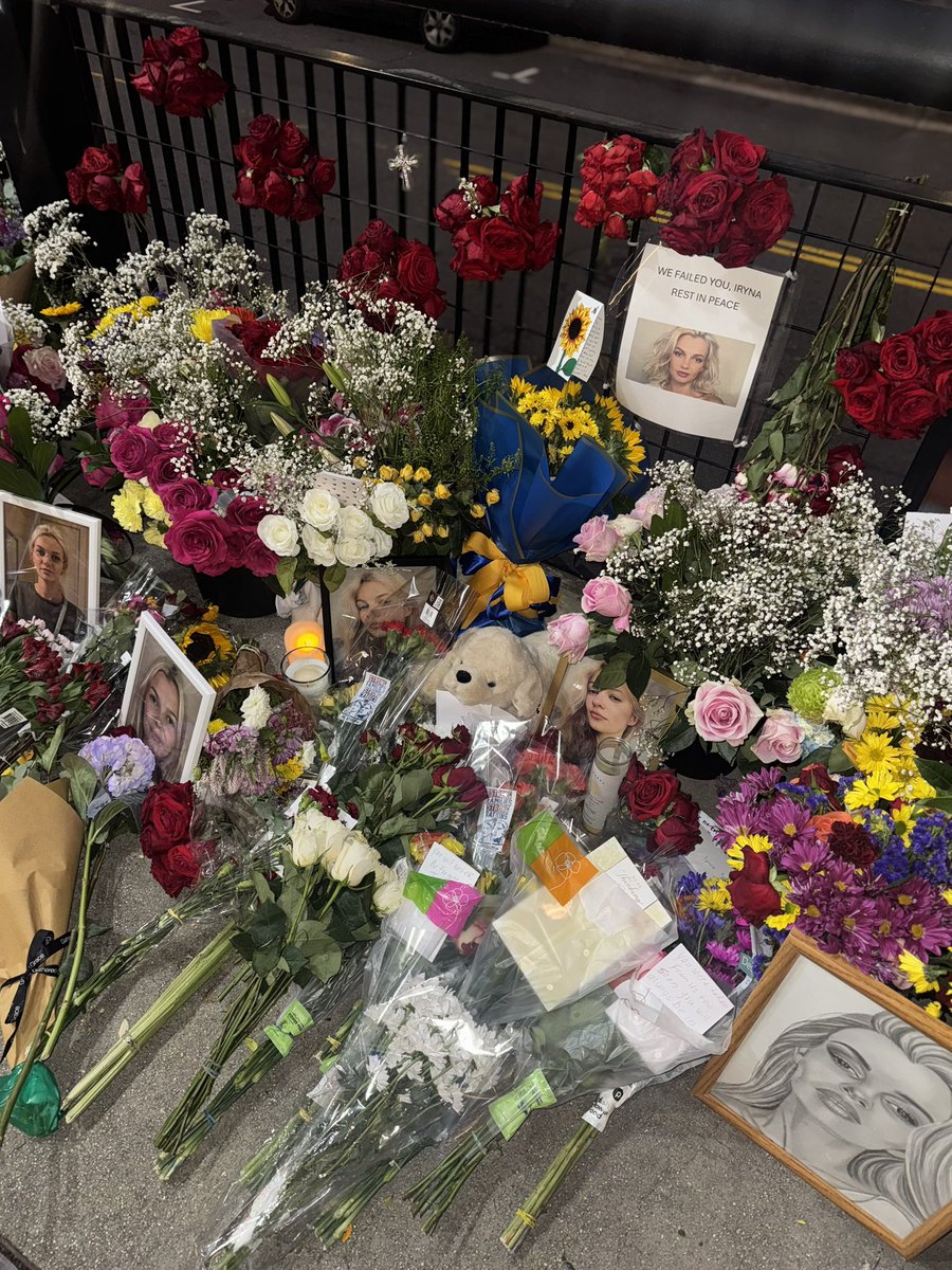 A memorial for Iryna Zarutska sits along the Charlotte Light Rail Trail in South End. People have laid flowers, photos, candles and stuffed animals in remembrance of her life.