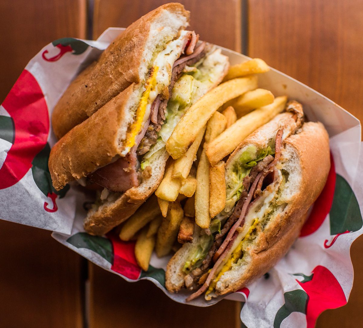 Hungry for a burst of flavor? Try our fan-favorite Argentinian Lomito Completo Sandwich. 🥪🔥 Packed with grilled steak, ham, fried egg and more, it's a culinary ride through Argentina! #SpiceTheAmericas #FanFavorite 🌎